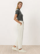 Slim-fit short-sleeve 100% Merino Wool mock neck tee with breathable, moisture-wicking fabric